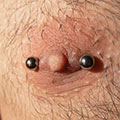 female nipple piercing